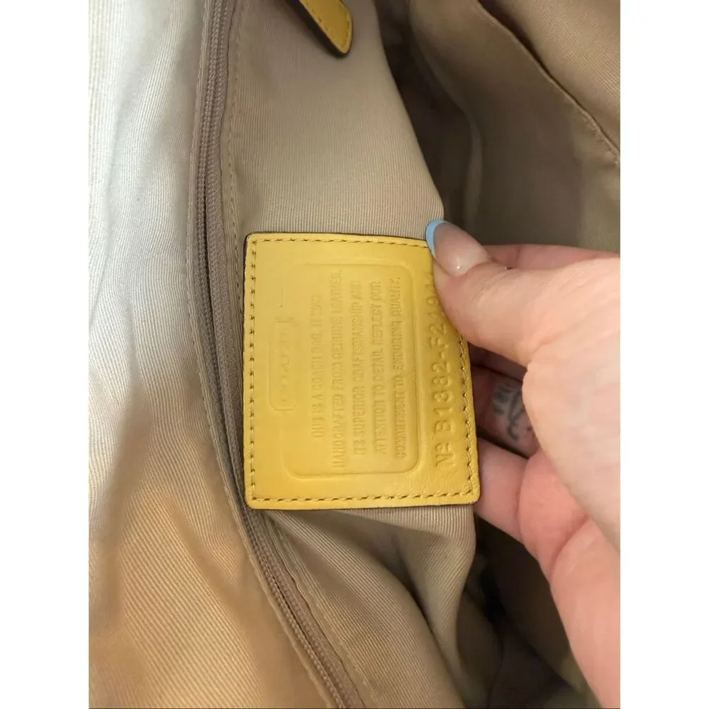 Coach perforated signature leather tote bag yellow